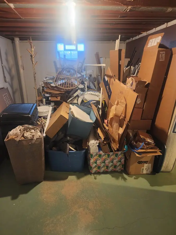 Roll-off dumpster container at job site for 20 Yard Dumpster Rental in Farley